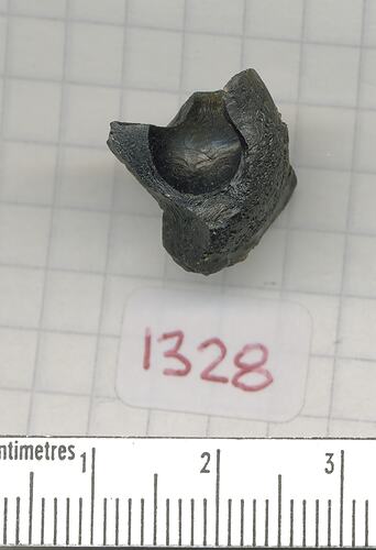 Hollow, button-shaped tektite.