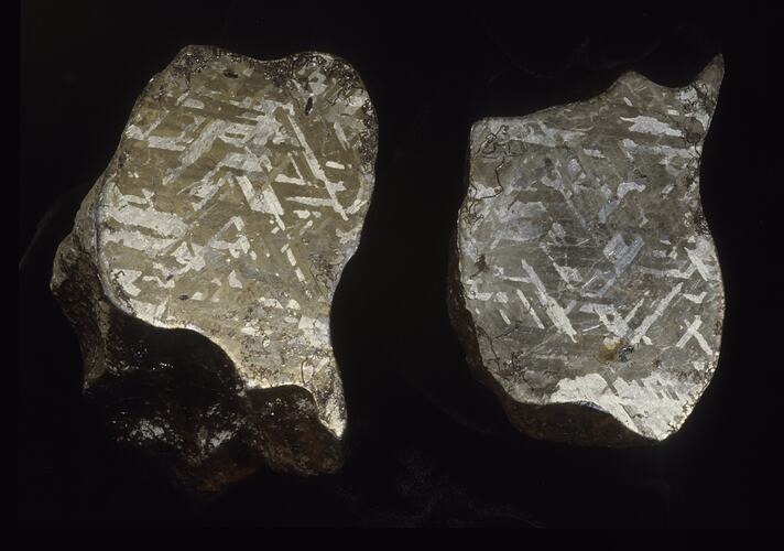 Cut portions of meteorite specimens.
