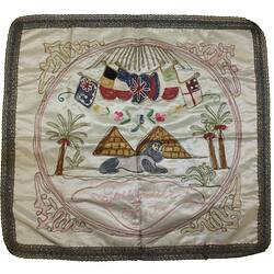 Front of embroidered panel with motifs including pyramids.