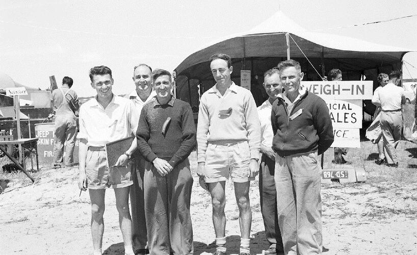 Monochrome photograph of a fishing competition.