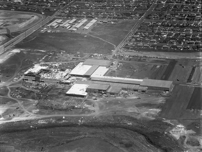 Monochrome aerial image of a construction site.