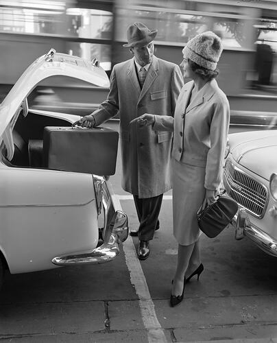 Australian Wool Board, Pair Near a Motor Car, Victoria, 07 Mar 1960