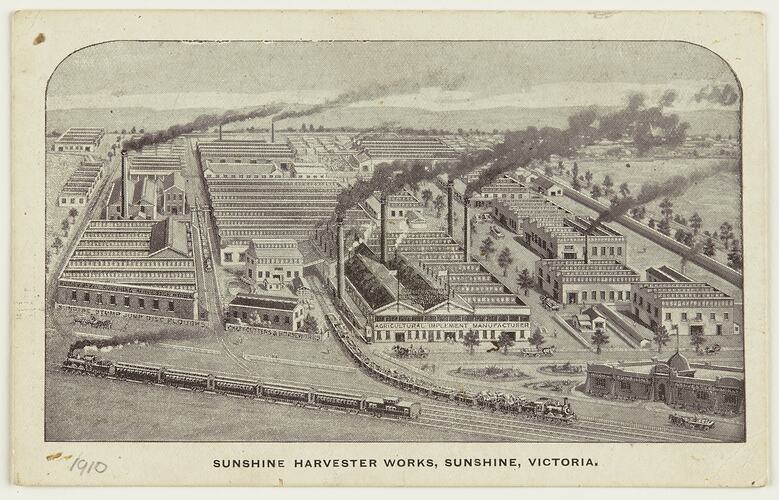 Aerial view of factory setting with trains in foreground. Text below.