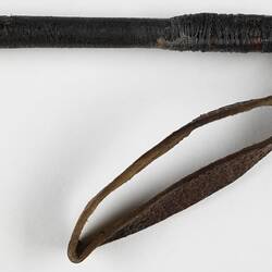 Detail of leather riding crop. Leather loop switch at end.