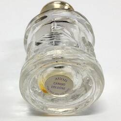 Underside of glass perfume bottle. Labelled.