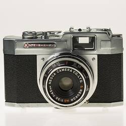 All-metal chrome and black body 35mm camera.