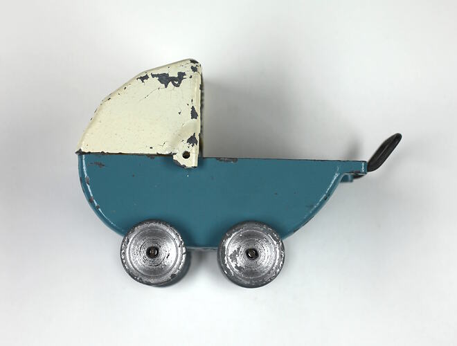 Blue and white toy pram.