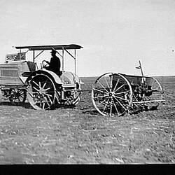 Photograph - H.V. McKay, Sunshine Model O Tractor with Sunshine Seed & Fertilizer Drill in a Field, Australia, circa 1920s