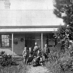 Negative - Family Portrait Outside a Weatherboard Cottage, Wangaratta, Victoria, circa 1900
