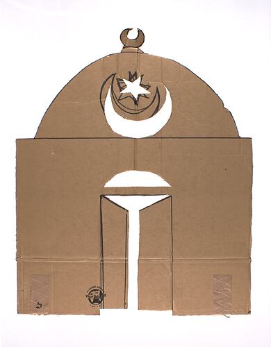 Two dimensional cardboard building with dome shaped roof featuring a crescent shape on the top.