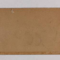Retangular brown card.