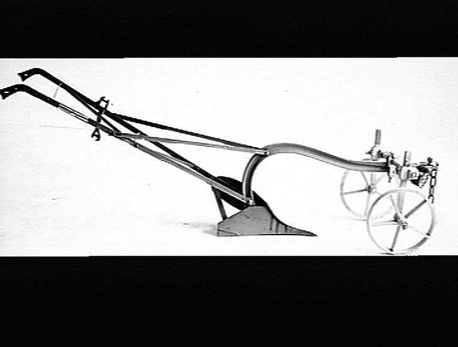 LEFT HAND PLOUGH FITTED WITH FORECARRIAGE. APRIL 1940