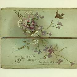 Pale grey-blue card with a four flap design. Opens horizontally. Has purple and white flowers, a bird and text at the bottom.