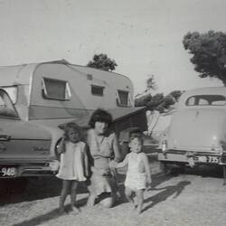 Digital Photograph - Woman, Girl & Baby in front of Caravan & Two Cars, Rye, 1964