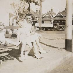 Digital Photograph - Mother, Boy & Girl Sitting on Public Seat, Middle Park, 1949