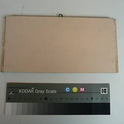 Painted board showing sample of colour pale pink.
