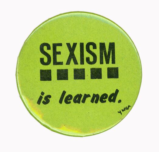 Green anti-sexism badge "Sexism is learned".