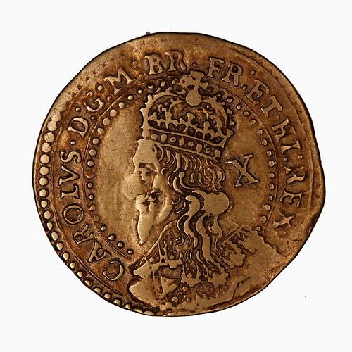 Coin, round, at centre partly within a circle of beads, crowned bust of the King facing left.
