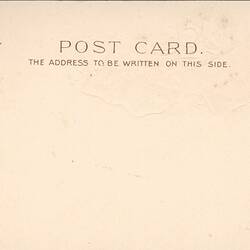 Post card with printed text on top of card.