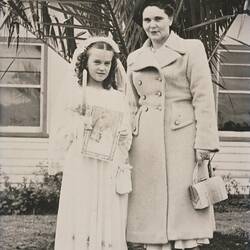 Girl Dressed for First Communion with Mother, Midway Migrant Hostel, Maribyrnong, 1950