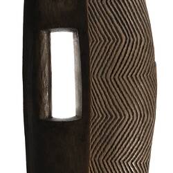 Wooden, wedge-shaped shield.