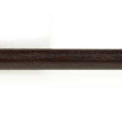 Wood and brass revolver cleaning rod. Textured brass tip.