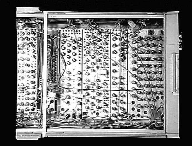Open cabinet of computer valves.