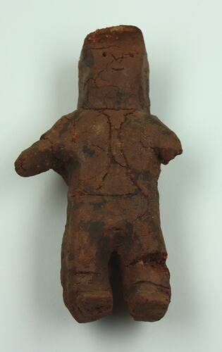 Toy human made from clay, front view.