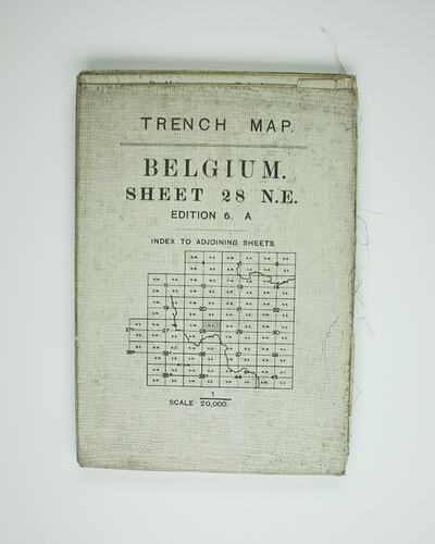 Map superimposed over a grid of squares, with text above.