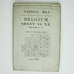 Map superimposed over a grid of squares, with text above.