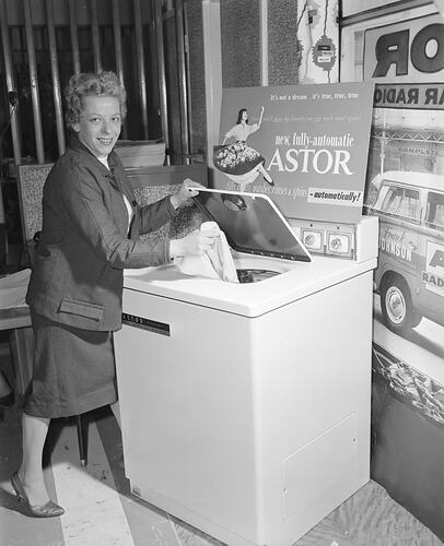 Astor Electronics, Woman with Washing Machine, Ampol House, Melbourne, 24 Jul 1959