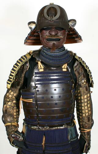 Resin and leather Japanese armour on manequin.