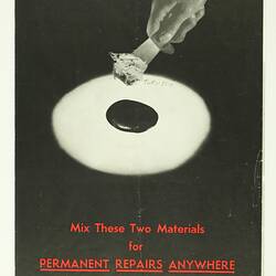 Front cover image with black and white adhesive.