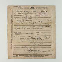 Paper with printed and handwritten text in black ink.