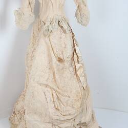Ivory dress, full length with half-sleeves, back.