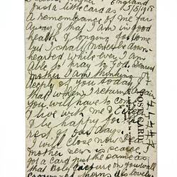 Back of postcard with extensive writing.