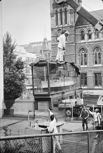 Workers delivering model of S. S. 'Orcades' to the Museum of Applied Science (Science Museum), Melbourne, c. 1956
