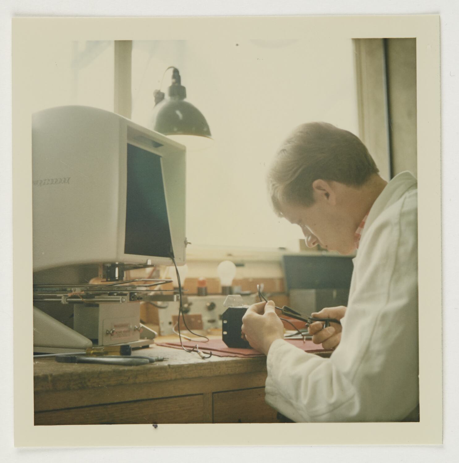 Photograph Worker Cutting Electrical Wires, Kodak Factory, Coburg