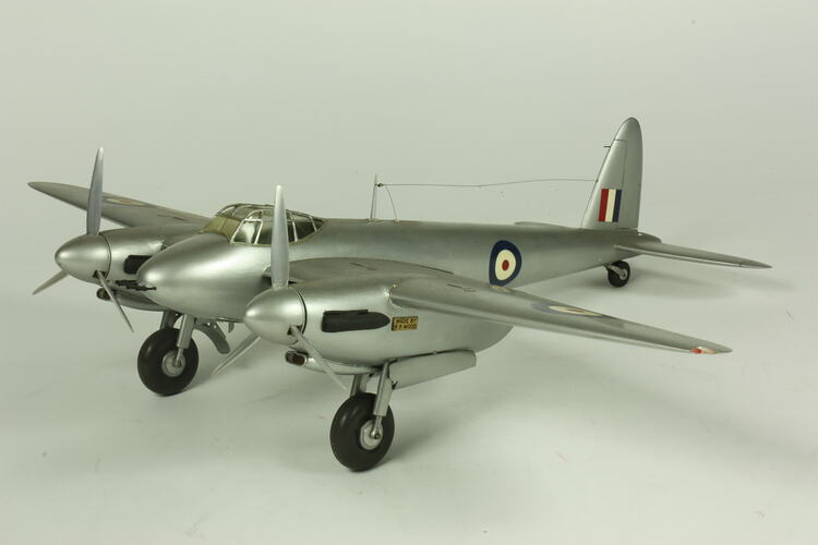 Silver model aeroplane.