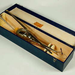 Chrome plated helicopter model. In rectangular presentation box.