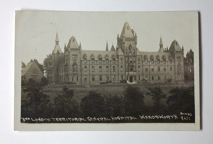 Large gothic style brick building.