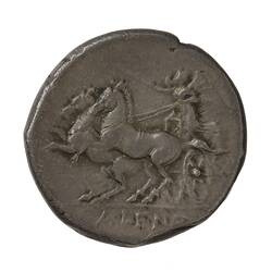 Greek goddess of Victory, Nike, driving a biga, with two horses, to left holding reins and a whip.