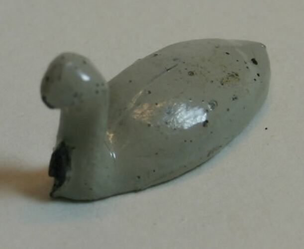 Toy metal white swan.