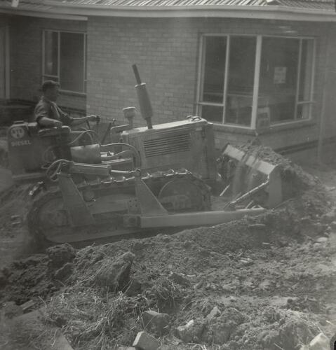 Digital Photograph - Man & Bulldozer Excavating Drive, House Building Site, Greensborough, circa 1958
