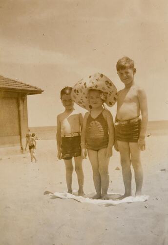 Digital Photograph - A Girl in Sunhat & Two Boys on St Kilda Beach, 1945