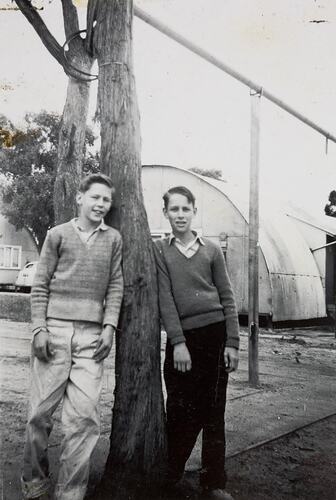 Digital Photograph - Two Boys in front of Nissan Hut, Nunawading Migrant Hostel, 1958-1959