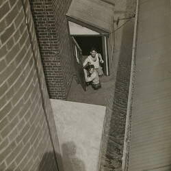Photograph - Kodak Australasia Pty Ltd, Two Men in a Flooded Doorway, Abbotsford, Victoria, 1934
