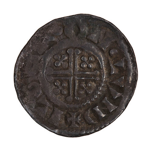 Coin, round, short cross voided within a beaded circle, a quatrefoil in each angle; text around.