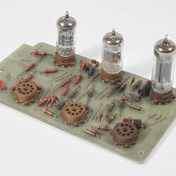 Circuit board with valves soldered on.