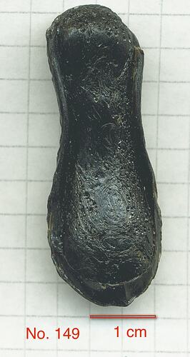 Dumbbell-shaped tektite.